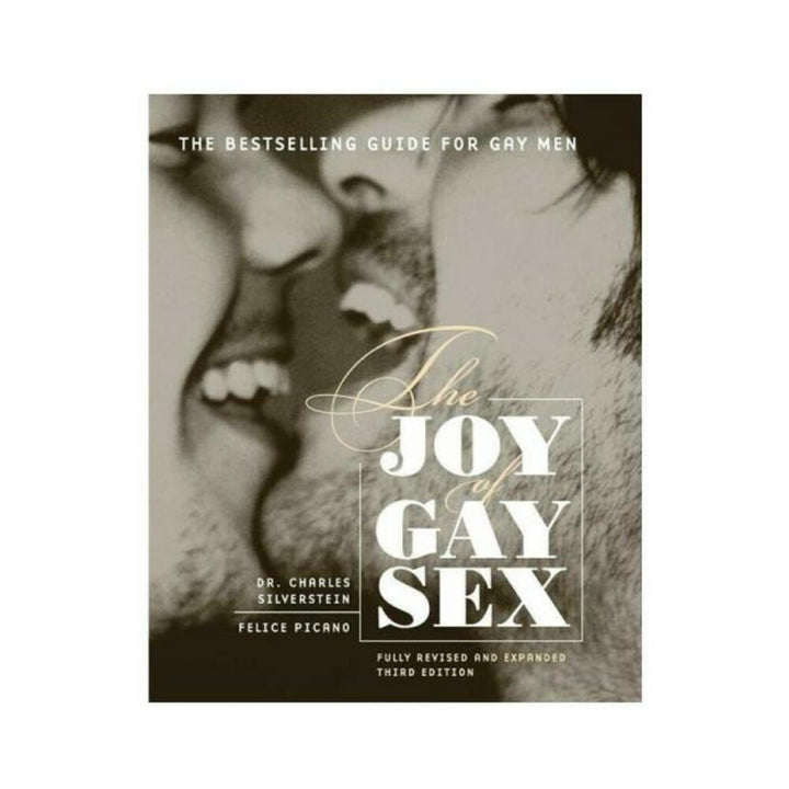 Book cover of The Joy of Gay Sex featuring a close-up black and white photo of two men smiling and touching faces.