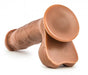 Realistic Latin brown dildo with suction cup base and detailed texture for versatile use.