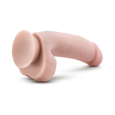 Beige realistic dildo with suction cup base, curved shaft, and textured details for versatile hands-free use.