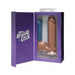 Packaging box of The Realistic Cock 8 inch with a lifelike dildo and a blue accessory inside.
