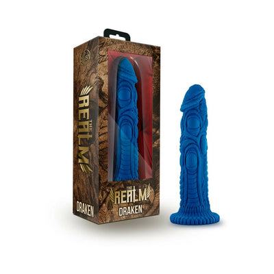 Blue dragon-themed silicone dildo with textured scales and flared base next to its brown and gold packaging box.