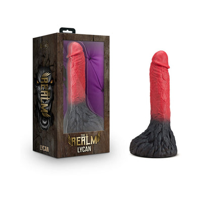 Red and black werewolf-themed dildo with textured base next to its packaging box featuring a wolf design and purple background.
