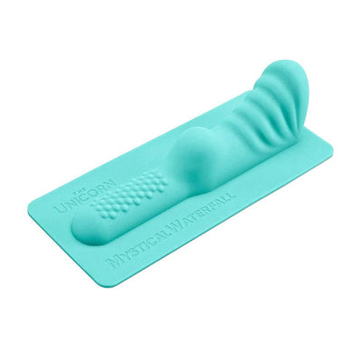 Turquoise silicone attachment with textured bumps and ridges designed for The Unicorn Mystical Waterfall machine.