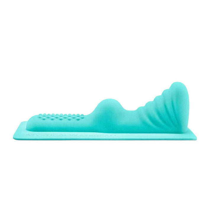 Turquoise silicone attachment with textured bumps and contoured design for The Unicorn Mystical Waterfall machine.