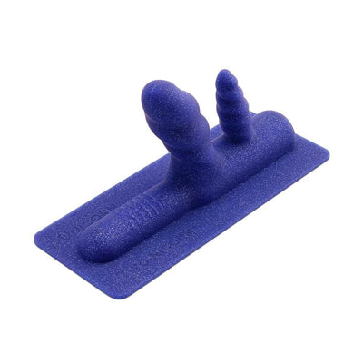 Blue glittery silicone double penetration attachment with dual textured heads on a flat base plate.