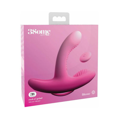 Packaging of Threesome Rock N Grind pink silicone vibrator with wireless remote on a pink background.