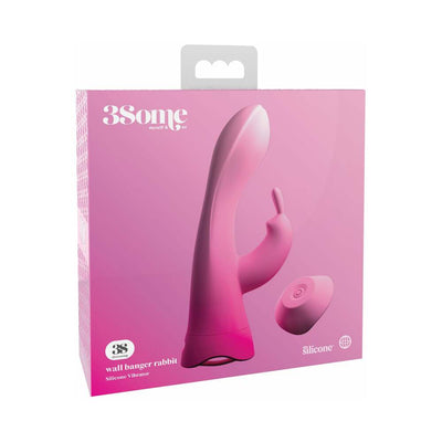 Pink silicone rabbit vibrator with wireless remote in branded 3some packaging.