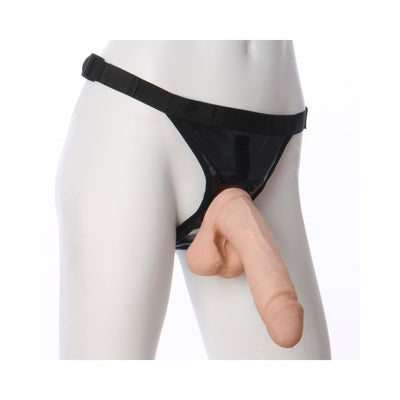 Beige 8-inch realistic dildo attached to adjustable black strap-on harness on mannequin.