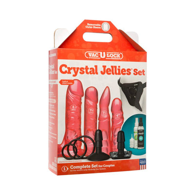 Vac-U-Lock Crystal Jellies Set in pink with four attachments, harness, rings, and water-based lube in retail packaging.