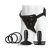 Black adjustable Vac-U-Lock harness with two silicone pegging attachments and three removable o-rings displayed on a white mannequin.