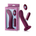 Dark fuchsia Femme Funn Versa Bullet vibrator with textured shaft sleeve and wireless remote in packaging and displayed separately.