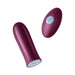 Dark fuchsia Femme Funn Versa bullet vibrator with textured remote control on white background.