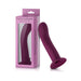 Dark fuchsia Femme Funn Versa S Sleeve with ergonomic curved design next to its pink retail packaging box.