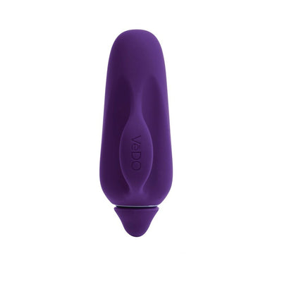 Compact purple silicone finger vibrator with ergonomic grip and smooth rounded tip, branded VeDO.