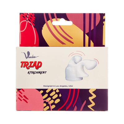 Packaging of Voodoo Triad Wand Attachment with colorful abstract design and product illustration on front.