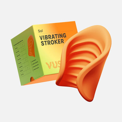 Orange ribbed vibrating stroker with flexible wings next to its green and orange gradient VUSH Sol Vibrating Stroker packaging box.