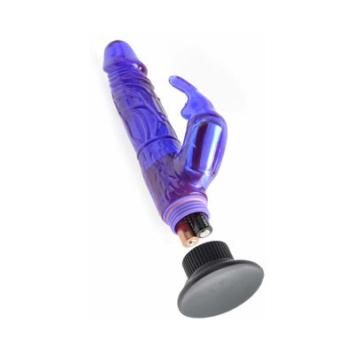 Purple waterproof vibrator with suction base and clitoral stimulator, showing battery compartment open with batteries inserted.