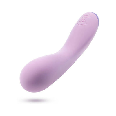 Purple curved Wellness G Curve vibrator with smooth silicone finish and ergonomic design for targeted stimulation.
