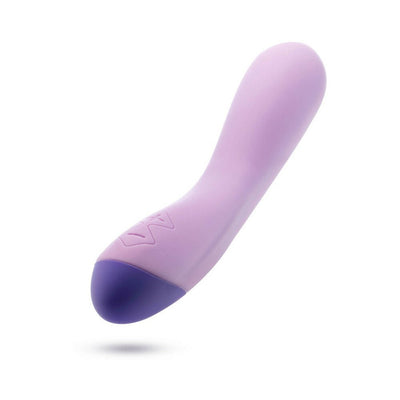 Sleek purple Wellness G Curve vibrator with curved design and smooth silicone finish for targeted G-spot stimulation.