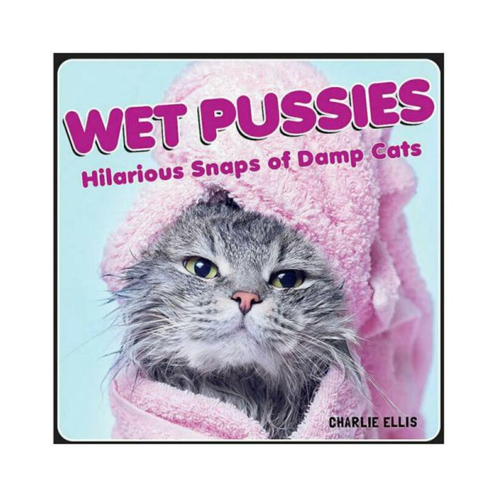 Book cover of Wet Pussies featuring a damp gray cat wrapped in a pink towel with playful purple text.