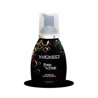 Wicked Foam 'n Fresh anti-bacterial foaming toy cleaner in a black bottle with colorful bubble design and clear pump top.