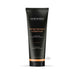 Black tube of Wicked Orange Blossom + Patchouli sensual massage cream with orange accents, 4 oz.