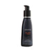 Black pump bottle of Wicked Ultra Heat warming silicone-based intimate lubricant 2oz with orange and white text.