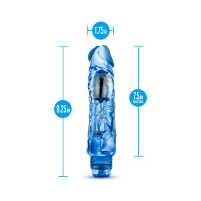 Blue translucent vibrator with realistic texture and dimensions labeled, standing upright on white background.