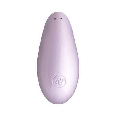 Compact Womanizer Liberty clitoral stimulator in soft lavender with smooth ergonomic design and discreet logo embossing.