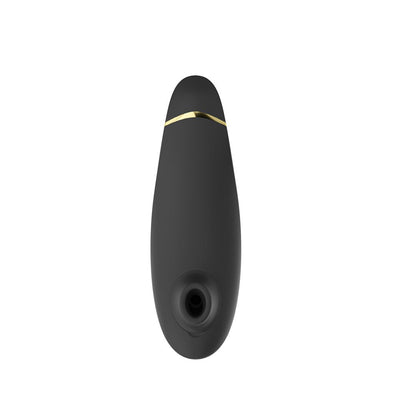 Black Womanizer Premium 2 clitoral stimulator with gold accent and silicone body, shown from front view on white background.