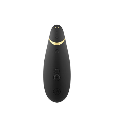 Black Womanizer Premium 2 clitoral stimulator with gold accent and control buttons on a white background.
