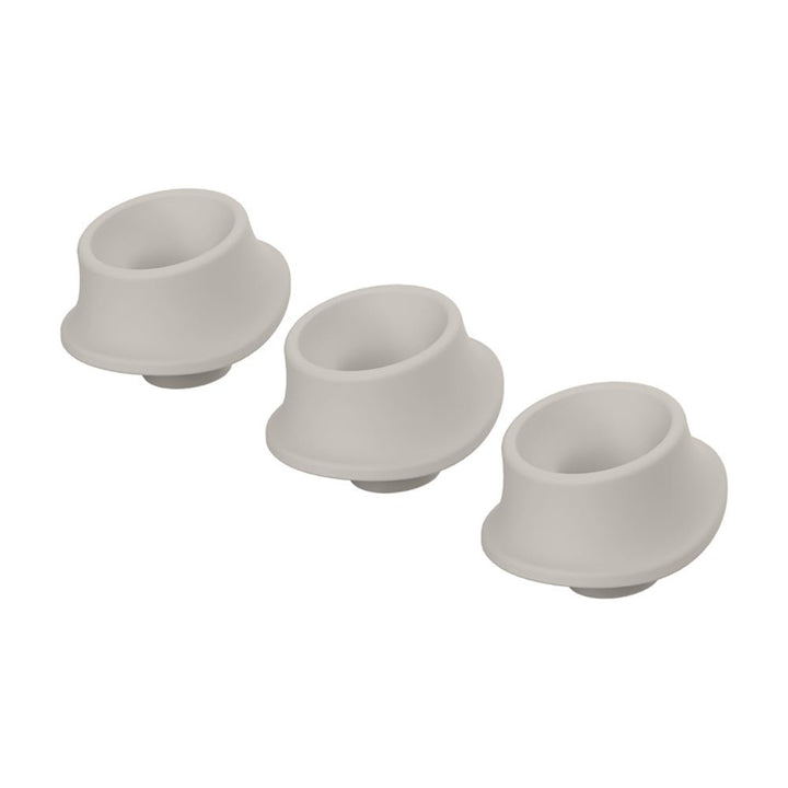 Three gray silicone replacement heads for Womanizer Premium and Classic models displayed on a white background.