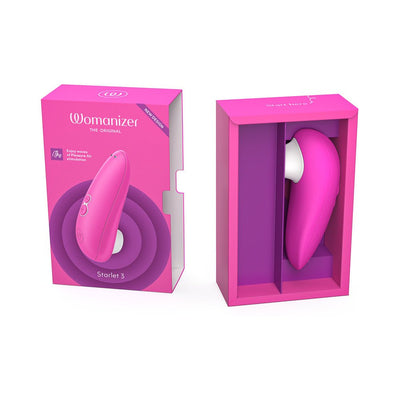 Pink Womanizer Starlet 3 clitoral stimulator displayed in open packaging box with product image on the cover.