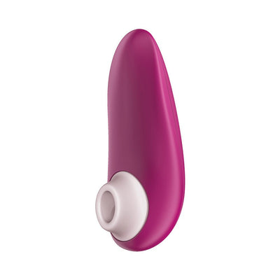 Womanizer Starlet 3 clitoral stimulator in vibrant pink with silicone head and ergonomic design.