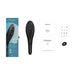 Womanizer Wave black handheld shower head with box, user manual, safety info, and accessory parts laid out on white background.