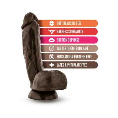 Natural-colored realistic dildo with suction cup base and textured details, highlighting soft feel and body-safe materials.