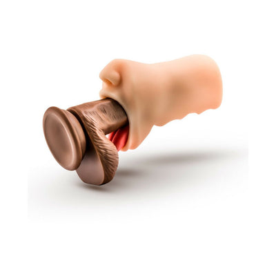 Vanilla-flavored TPE mouth stroker with realistic tongue and ribbed orifice for enhanced stimulation.