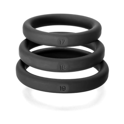 Set of three black silicone rings in medium to large sizes stacked, each marked with size numbers 17, 18, and 19.