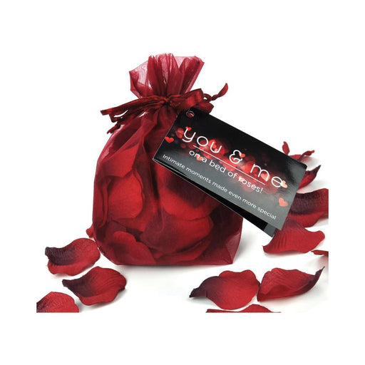 Red fabric rose petals in a sheer red drawstring bag with a romantic "You & Me" tag.