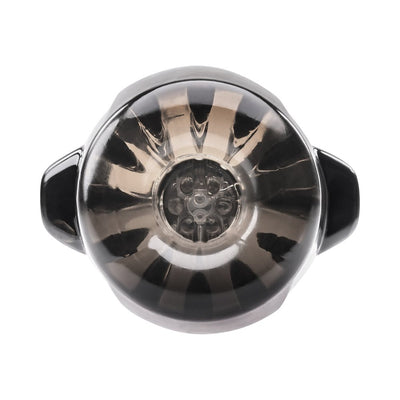 Top view of the Zero Tolerance A Sucking Good Time rechargeable vibrating stroker in black smoke with textured inner chamber and side handles.