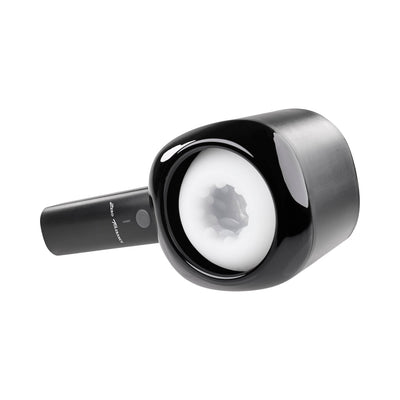 Black ergonomic rechargeable stroker with white textured inner sleeve and one-button control.