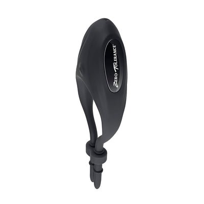 Black adjustable silicone vibrating cock ring with dual tails and Zero Tolerance logo on a white background.
