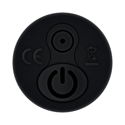 Close-up of the black vibrating bullet control button for the ZT Bell Ringer penis ring.