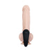 Black vibrating ball cradle worn on a realistic flesh-toned silicone model with textured surface and dual rings.