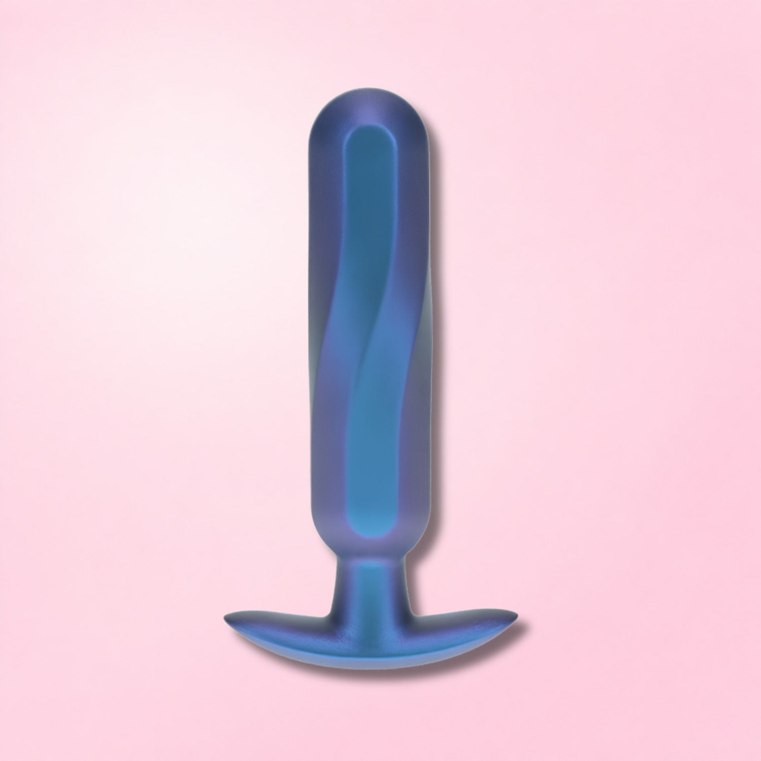 Three anal dildos in varying sizes and designs displayed against a blue background with an apple for size comparison.