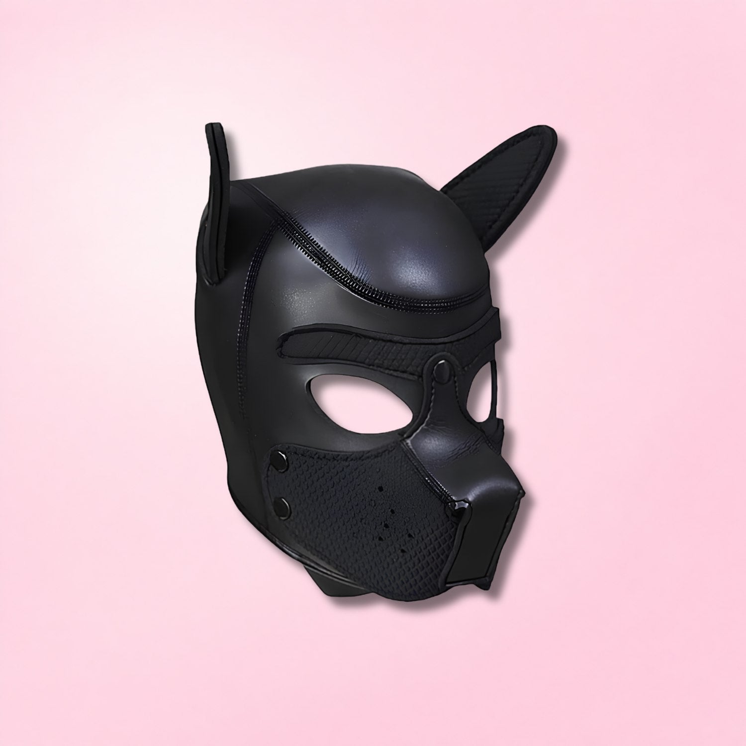 Black perforated leather bondage hood with red accent covering the face and head for sensory restriction.